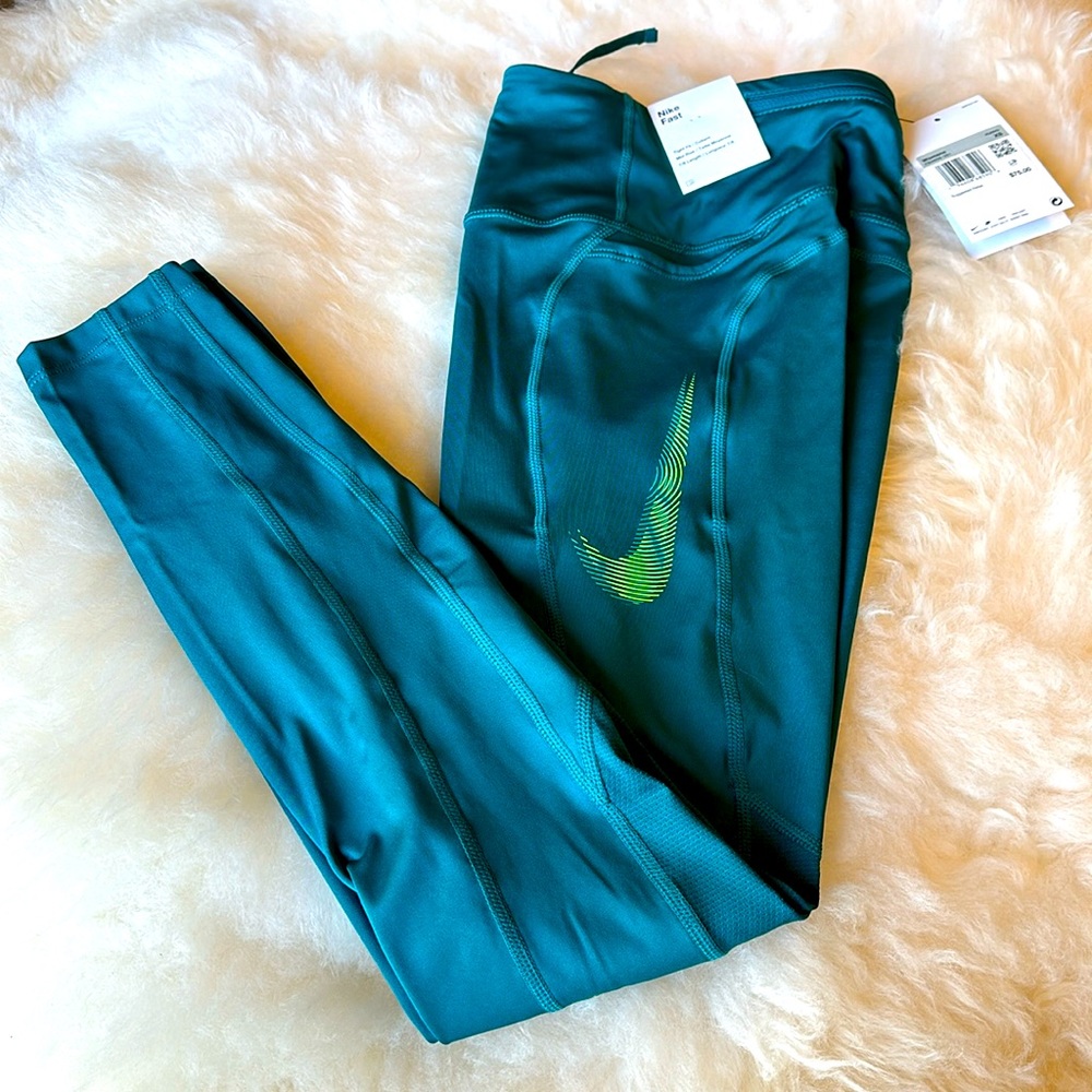 Nike Fast Leggings 
Women's Mid-Rise 7/8 Running Leggings with Pockets Sz XS